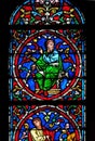 Colorful stained glass window in the Notre Dame Cathedral in Paris