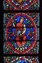 Colorful stained glass window in the Notre Dame Cathedral in Paris Royalty Free Stock Photo