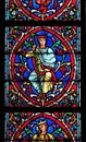 Colorful stained glass window in the Notre Dame Cathedral in Paris Royalty Free Stock Photo