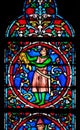 Colorful stained glass window in the Notre Dame Cathedral in Paris Royalty Free Stock Photo