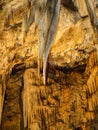 Colorful stalactites in the cave Royalty Free Stock Photo