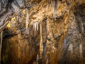 Colorful stalactites in the cave Royalty Free Stock Photo