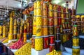 A lot of olives, canned goods and spices being sold in market of Marrakesh. Morocco, North Africa Royalty Free Stock Photo