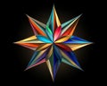 a colorful star made out of paper on a black background Royalty Free Stock Photo