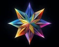 a colorful star made out of paper on a black background Royalty Free Stock Photo