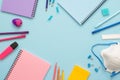 Colorful stationery set on the blue background. Royalty Free Stock Photo
