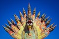 Colorful statue of the King of Nagas or Serpent king in the temple.