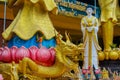Colorful statues in interior and exterior of buddhist temple Wat in Thailand