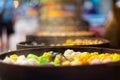 Colorful steamed dim sum, chinese dumpling in a wooden steamer. at Jalan Alor night market, Kuala Lumpur, Malaysia