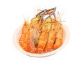 Colorful steamed shrimps in white paper dish isolated on white background with clipping path Royalty Free Stock Photo
