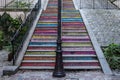 Colorful steps from a street in Montmartre leading up to the Basilica of the Sacred Heart of Paris. Royalty Free Stock Photo