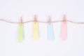 Colorful sticker label hanging on rope isolated white background Royalty Free Stock Photo