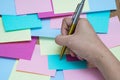 Colorful sticky notes on cork bulletin board Royalty Free Stock Photo