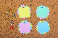 colorful sticky notes on cork bulletin board. Question mark made of pushpins