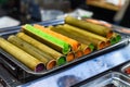 Colorful sticky rice in bamboo in vietnamese night market Royalty Free Stock Photo