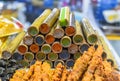 Colorful sticky rice in bamboo in vietnamese night market Royalty Free Stock Photo