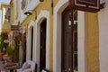 colorful and stone houses in narrow street in Alacati cesme Royalty Free Stock Photo