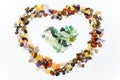 Colorful stones in heart shape isolated Royalty Free Stock Photo