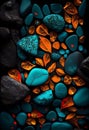 Colorful stones with orange and blue petals on black background Royalty Free Stock Photo