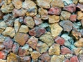 Colorful stones wall in public area Royalty Free Stock Photo