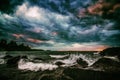 Colorful Storm Clouds Over Turbulent Sea. Dramatic Cloudscape and Seascape Background. Royalty Free Stock Photo