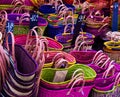 Colorful straw bags in a street market Royalty Free Stock Photo