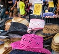 Colorful straw hats for sale at fall fair