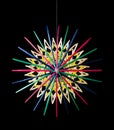 Colorful straw star Christmas decoration over black