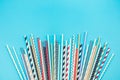 Colorful straws collections on pastel background.party