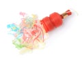 Colorful streamers with red party cracker isolated on white, top view Royalty Free Stock Photo