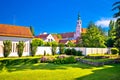 Colorful street and green park in baroque town Varazdin