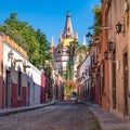 Colorful street of San Miguel de Allende, colonial town in Mexico. UNESCO World Heritage Site Royalty Free Stock Photo