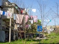 Colorful street. Yard with stretched clotheslines. Clothes are dried in the yard. Quiet backyard of Georgia