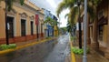 Colorful street in Yauco Puerto Rico with tropical trees