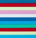 Colorful striped background. Plastique sticks of different color Royalty Free Stock Photo