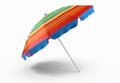 A colorful striped beach umbrella is open and sitting on a white background Royalty Free Stock Photo
