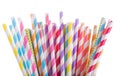 Colorful striped drinking straws on white background
