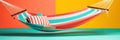 Colorful striped hammock on orange red background with copy space. Abstract minimalist summer vacation relax backdrop. Created Royalty Free Stock Photo