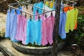 Colorful striped underwear hang outside to dry on laundry day in rural Vietnam