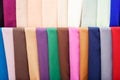 Colorful strips of fabric hang in the store