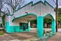 Colorful Stucco Covered Abandoned Gas Station