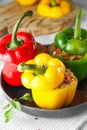 Colorful stuffed peppers with rice and minced meat. Stuffed paprika with rice and meat Royalty Free Stock Photo