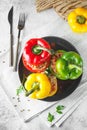 Colorful stuffed peppers with rice and minced meat. Stuffed paprika with rice and chopped meat Royalty Free Stock Photo