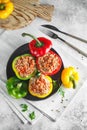 Colorful stuffed peppers with rice and minced meat. Stuffed paprika with rice and chopped meat Royalty Free Stock Photo