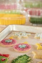 Colorful sugar holiday cookies on a baking sheet