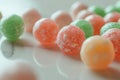 Colorful Sugared Candies on a Reflective Surface
