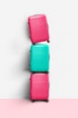 Colorful suitcases, stacked, Funny travel vacation creative concept