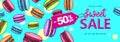 Colorful summer big sale poster with sweet macaron cakes. French macaroons. Junk food background
