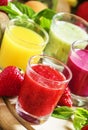 Colorful summer fruit and berry juices and smoothies in glasses: Royalty Free Stock Photo