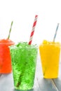 Colorful summer slushies on blue wood Royalty Free Stock Photo